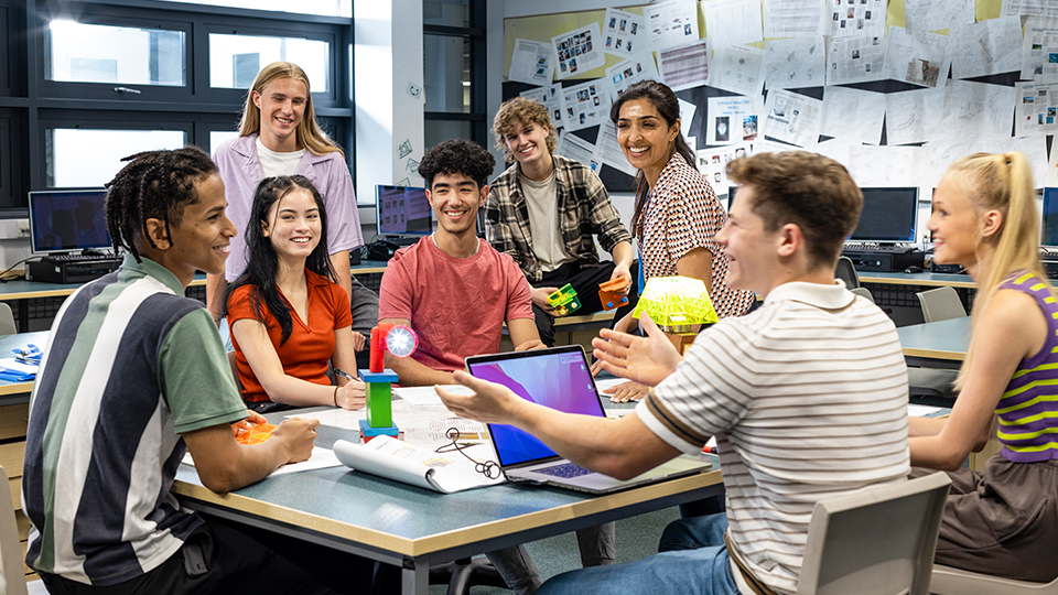 A group of students around a table