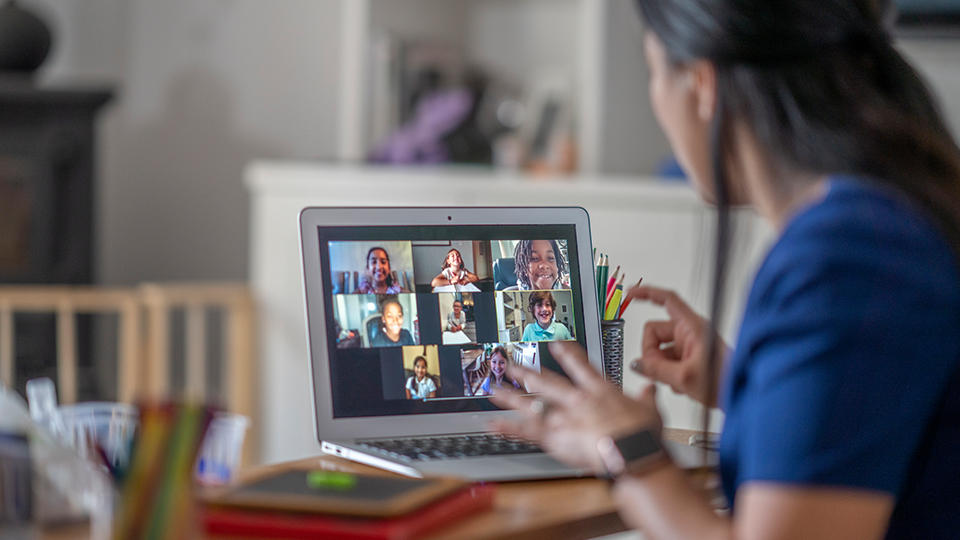 Teachers connecting with students through video chat