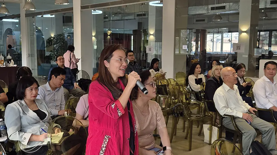 Woman intervening during the meeting